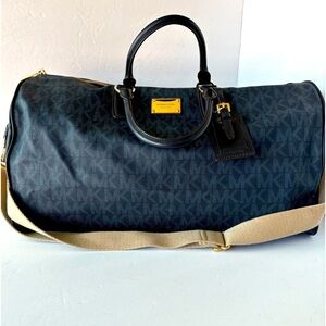 Michael Kors EUC Navy Printed Canvas Duffel Bag.